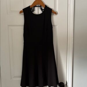 Elegant Black Sleeveless Midi Dress with Lace Back